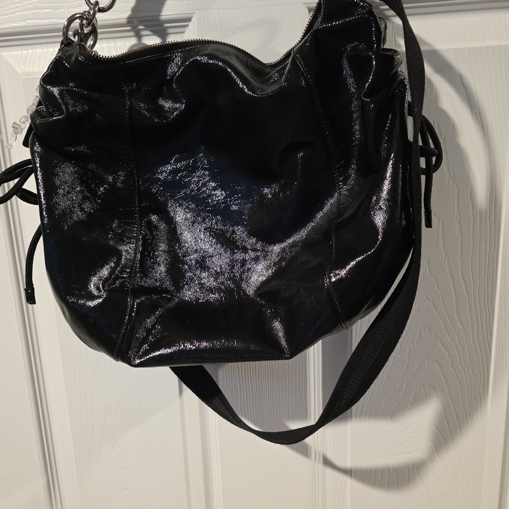 Coach Poppy Jazzy Hobo Bag. 2-way bag made of glossy black patent Leather. - Picture 11 of 11